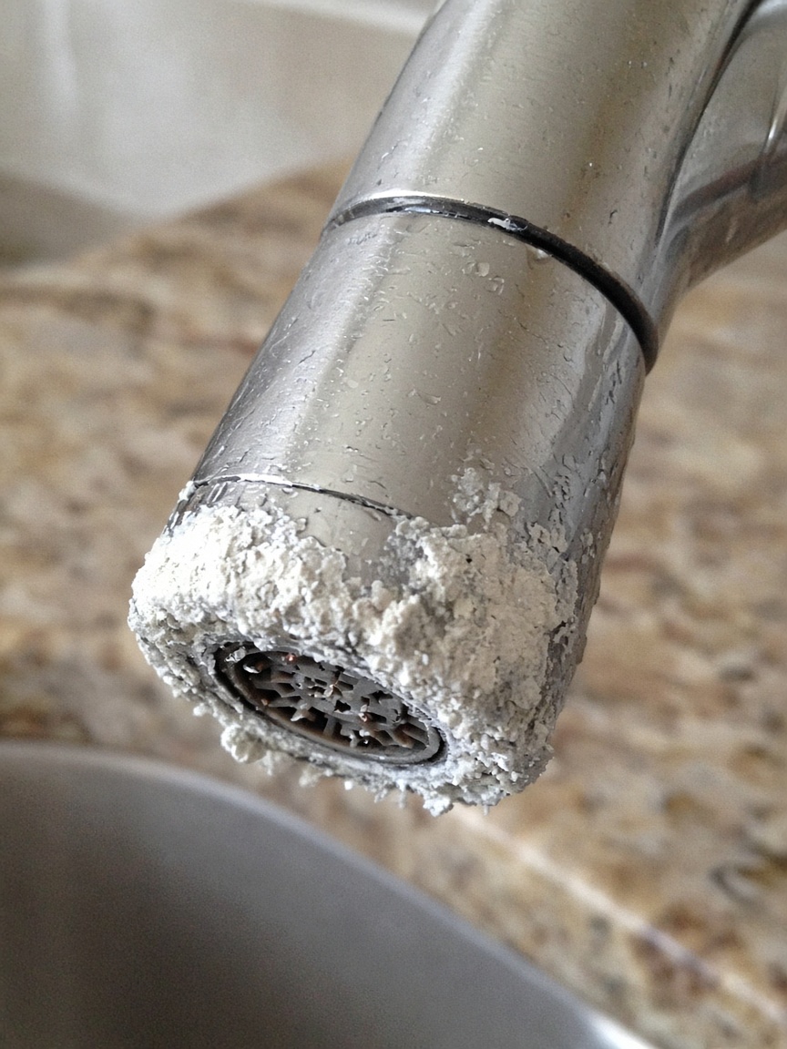 White crust on a faucet